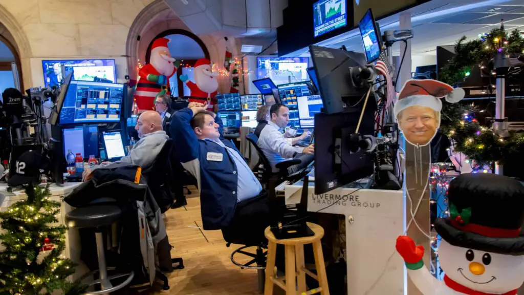 Markets thinned by the holidays were cheered by a strong finish on Wall Street