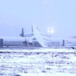 An Air Canada plane catches fire during a crash landing