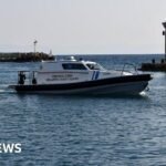 Eight migrants drown after boat tries to evade Greek ship