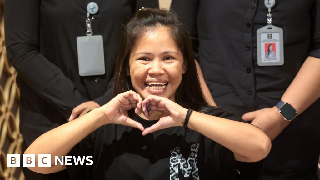 Filipina, who narrowly escaped being shot by the death row squad, leaves Indonesia