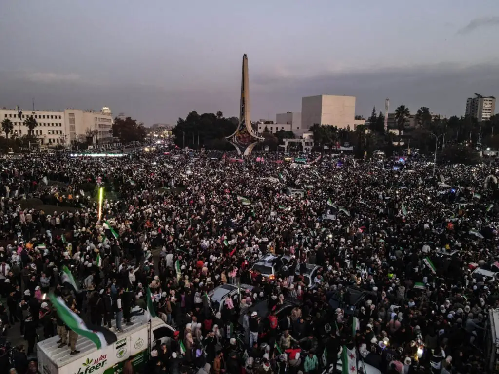 Thousands of Syrians celebrate new government in Umayyad Square | Syria’s war