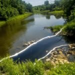 The head of a chemical company is facing criminal charges over the Flint River spill that caused miles of contamination