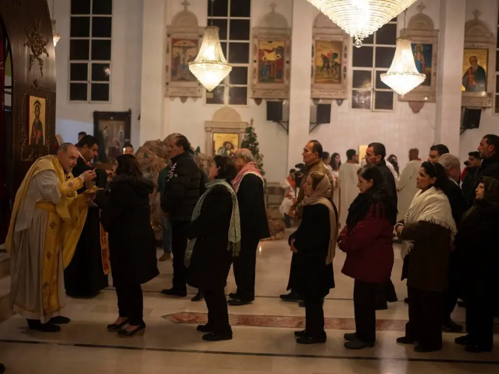 Syrian Christians attend the first Christmas Eve service since the fall of al-Assad | Religious News