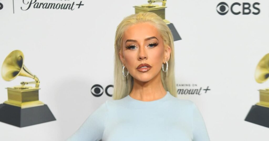 Christina Aguilera poses topless to celebrate her 44th birthday