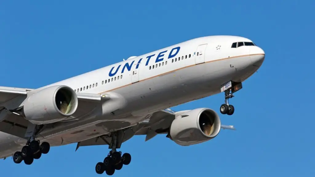 Person found dead in wheel well of United plane