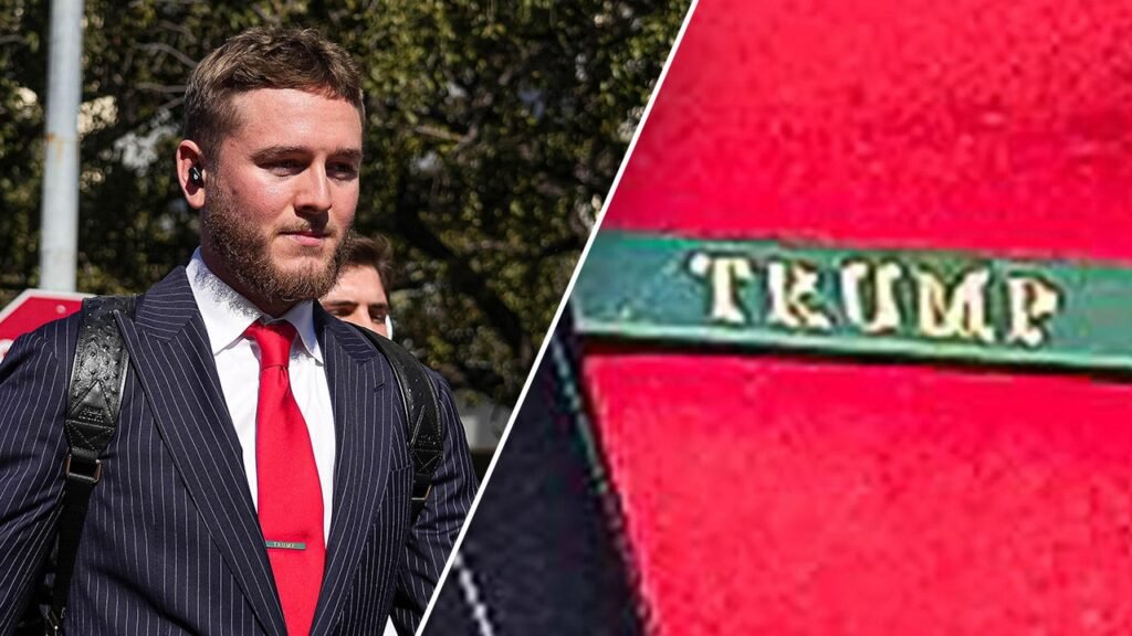 Texas’ Quinn Ewers wears a Trump tie clip before the College Football Playoff game