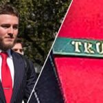 Texas’ Quinn Ewers wears a Trump tie clip before the College Football Playoff game