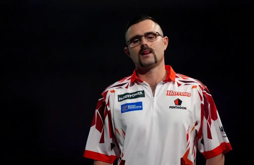 Heta throws a nine-darter but is eliminated