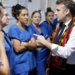 French President Emmanuel Macron tours hurricane-hit Mayotte and meets survivors asking for help