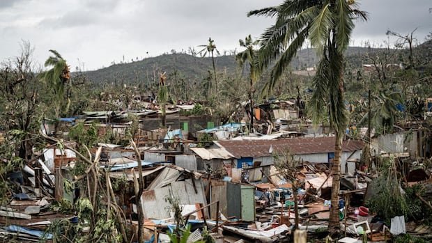 Help rushed to cyclone-hit Mayotte, and rescuers searched the rubble for survivors