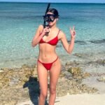Olivia Rodrigo turns heads on vacation in a red bikini