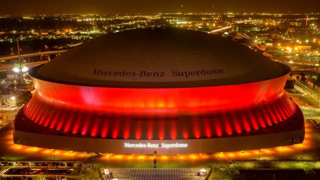 Where is the event location of the NFL championship game? Stadium, city, in which Lionel Messi could participate