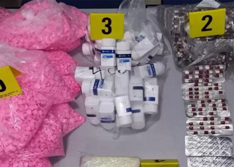 The police confiscated 20,185 ecstasy tablets in the bust of drug trafficking