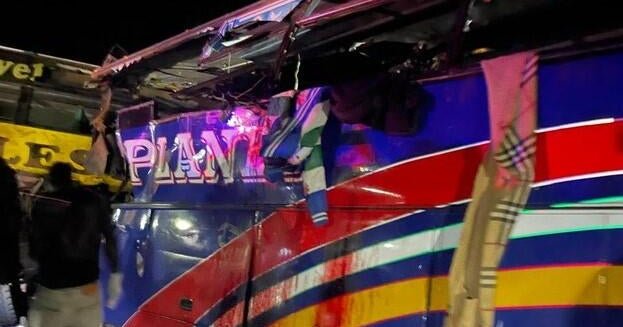 Dozens of people were killed in a multi-vehicle accident in Uganda when two buses collided head-on, police said