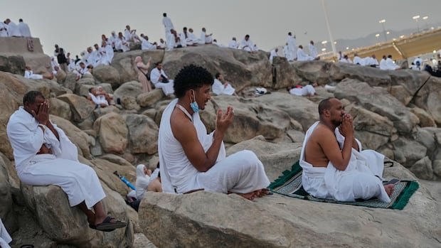 Muslim pilgrims endure Saudi Arabia’s sweltering heat at the peak of the Hajj